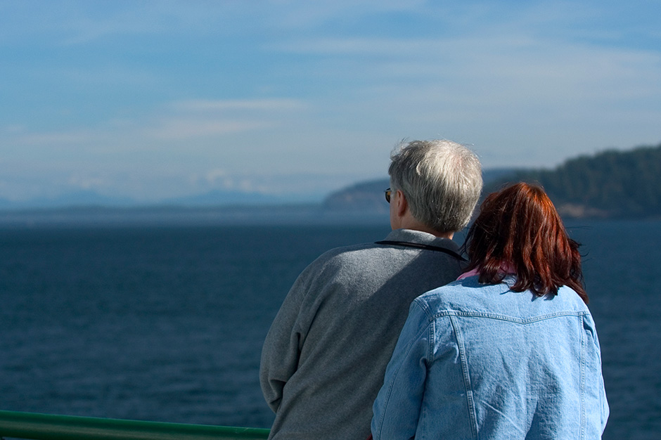 Discover the best of the USA and Canada by rail with Amtrak Vacations. Couple overlooking a lake