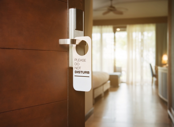 do not disturb tag on hotel door handle