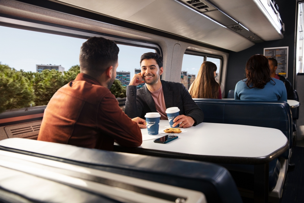 friends at table in Amtrak cafe car